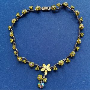 Flowers and a butterfly gem necklace